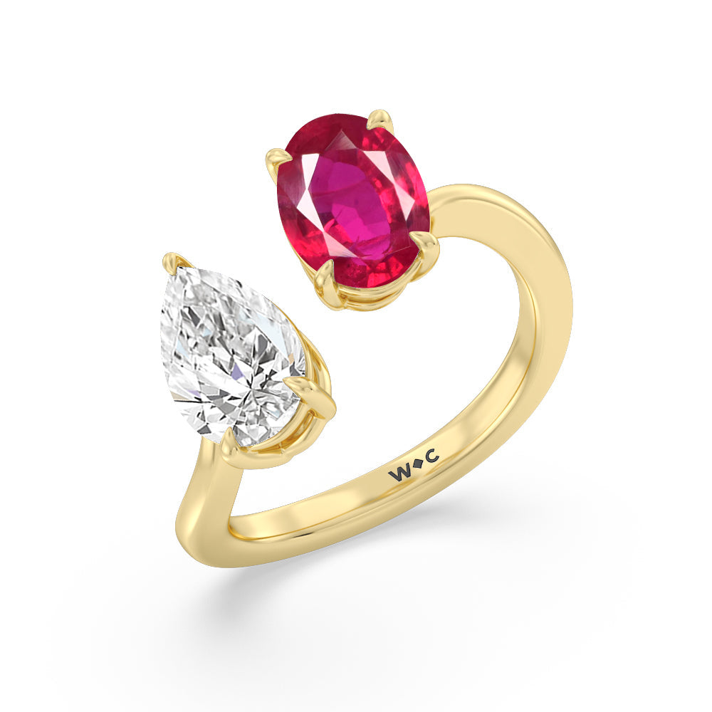 Toi Et Moi Created Ruby Oval and Pear Diamond Curved Engagement Ring with 14KT Yellow Gold Cut Diamond in 14KT Yellow Gold view 2
