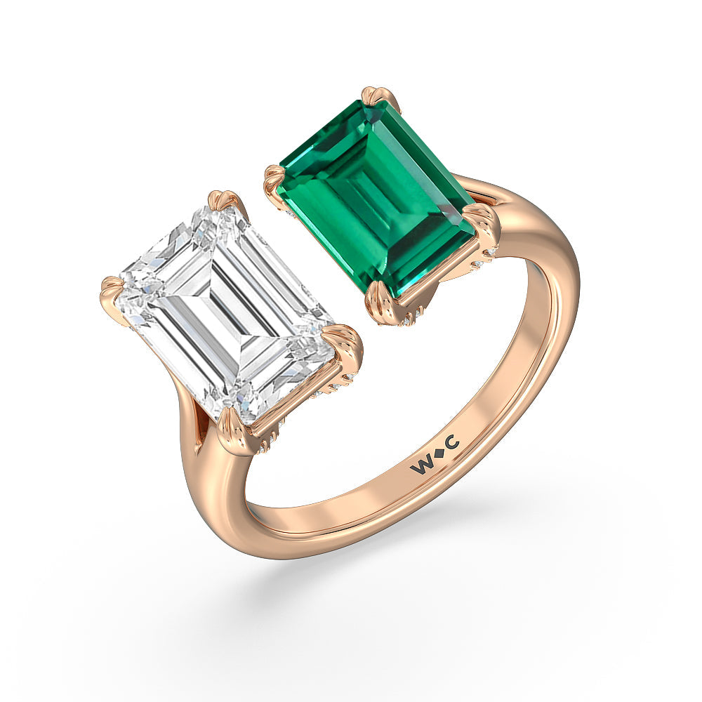 Toi Et Moi Created Emerald and Emerald Shape Diamond Studded Basket Engagement Ring with 14KT Rose Gold Cut Diamond in 14KT Rose Gold view 2

