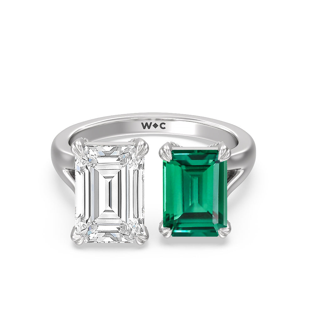 Toi Et Moi Created Emerald and Emerald Shape Diamond Studded Basket Engagement Ring with 14KT White Gold Cut Diamond in 14KT White Gold view 1
