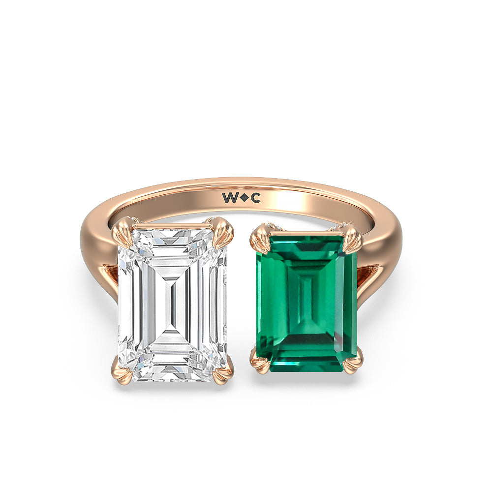 Toi Et Moi Created Emerald and Emerald Shape Diamond Studded Basket Engagement Ring with 14KT Rose Gold Cut Diamond in 14KT Rose Gold view 1

