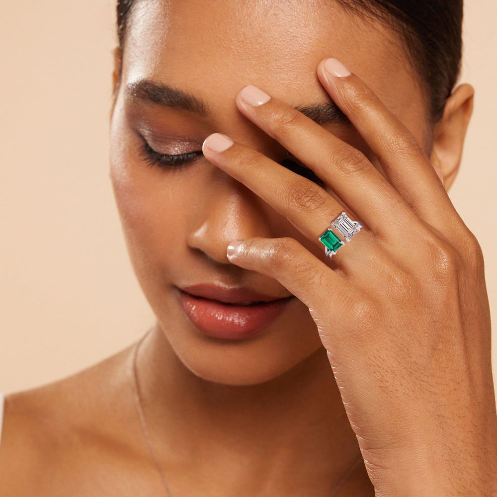 Model Wearing Toi Et Moi Created Emerald and Emerald Shape Diamond Studded Basket Engagement Ring view