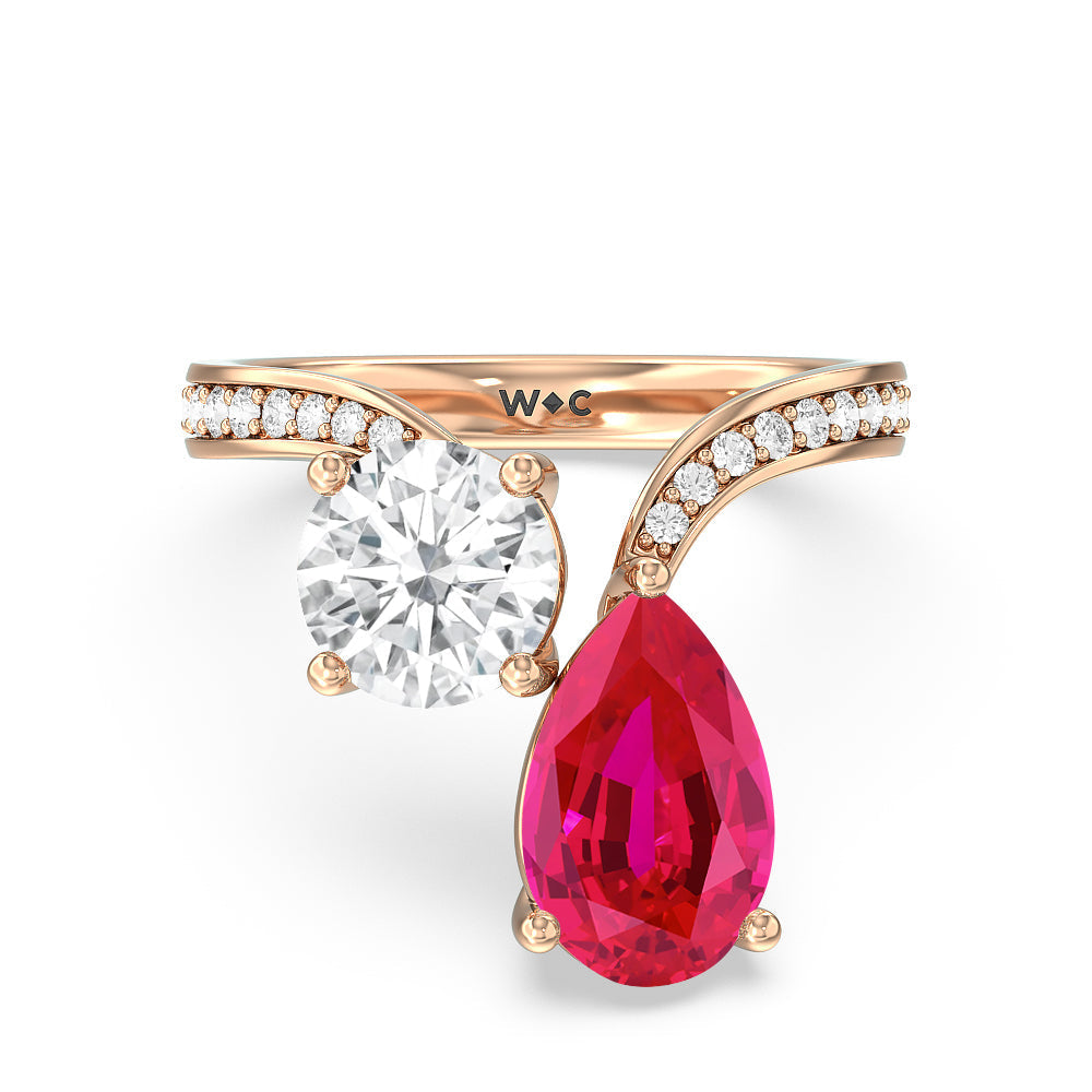 Toi Et Moi Created Ruby pear and round Diamond Engagement Ring with 14KT Rose Gold Cut Diamond in 14KT Rose Gold view 1

