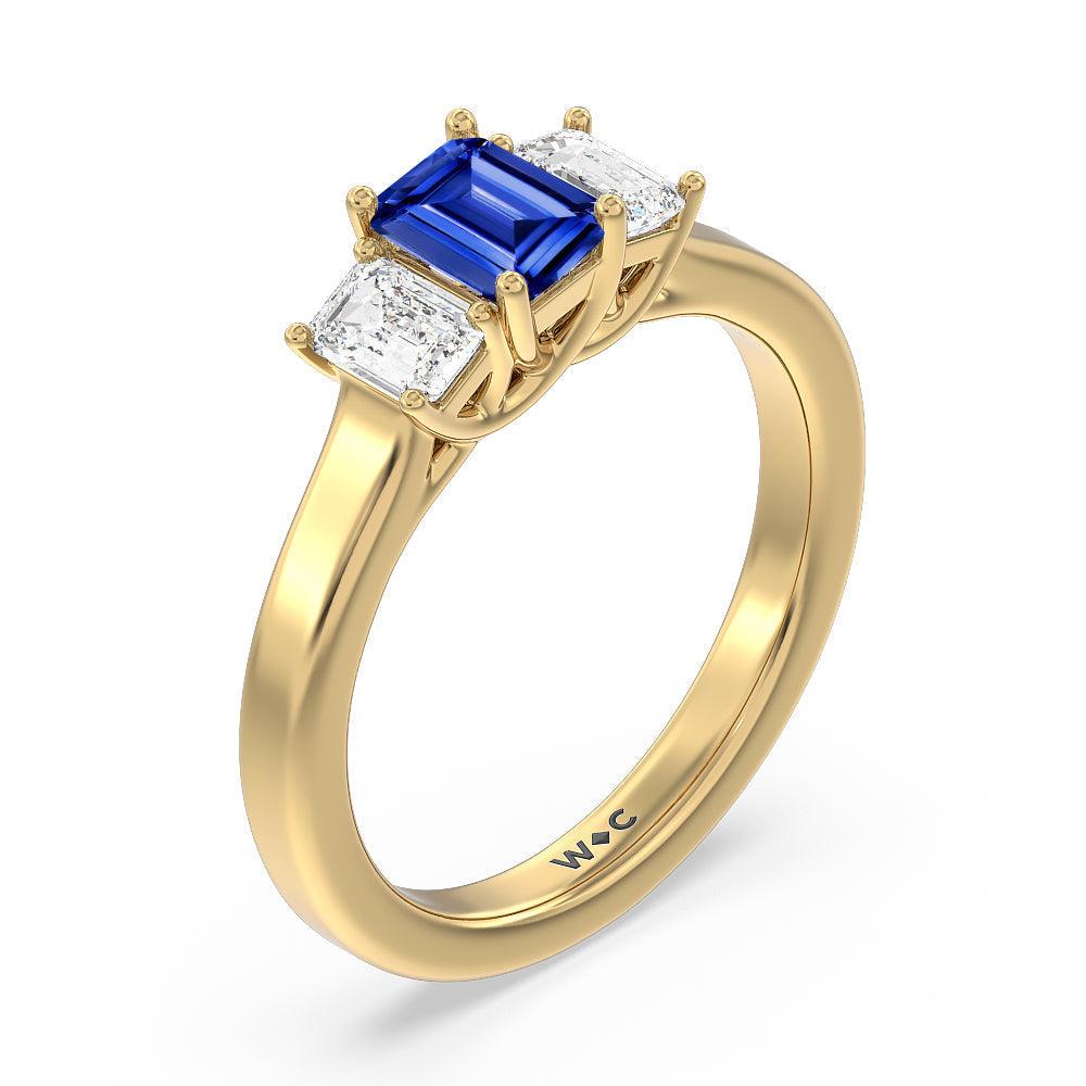 Created Sapphire Center And Emerald Cut Three Stone Diamond Ring with 14KT Yellow Gold Cut Diamond in 14KT Yellow Gold view 2
