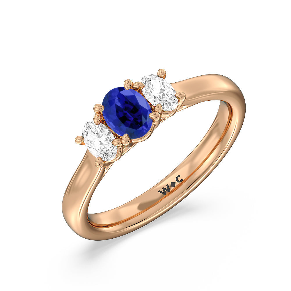 Created Sapphire Center And Oval Cut Three Stone Diamond Ring with 14KT Rose Gold Cut Diamond in 14KT Rose Gold view 2
