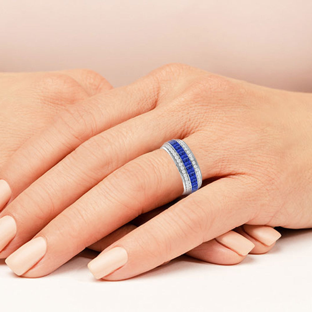 Model Wearing Triple Row Created Sapphire Princess and Round Diamond Eternity Ring view