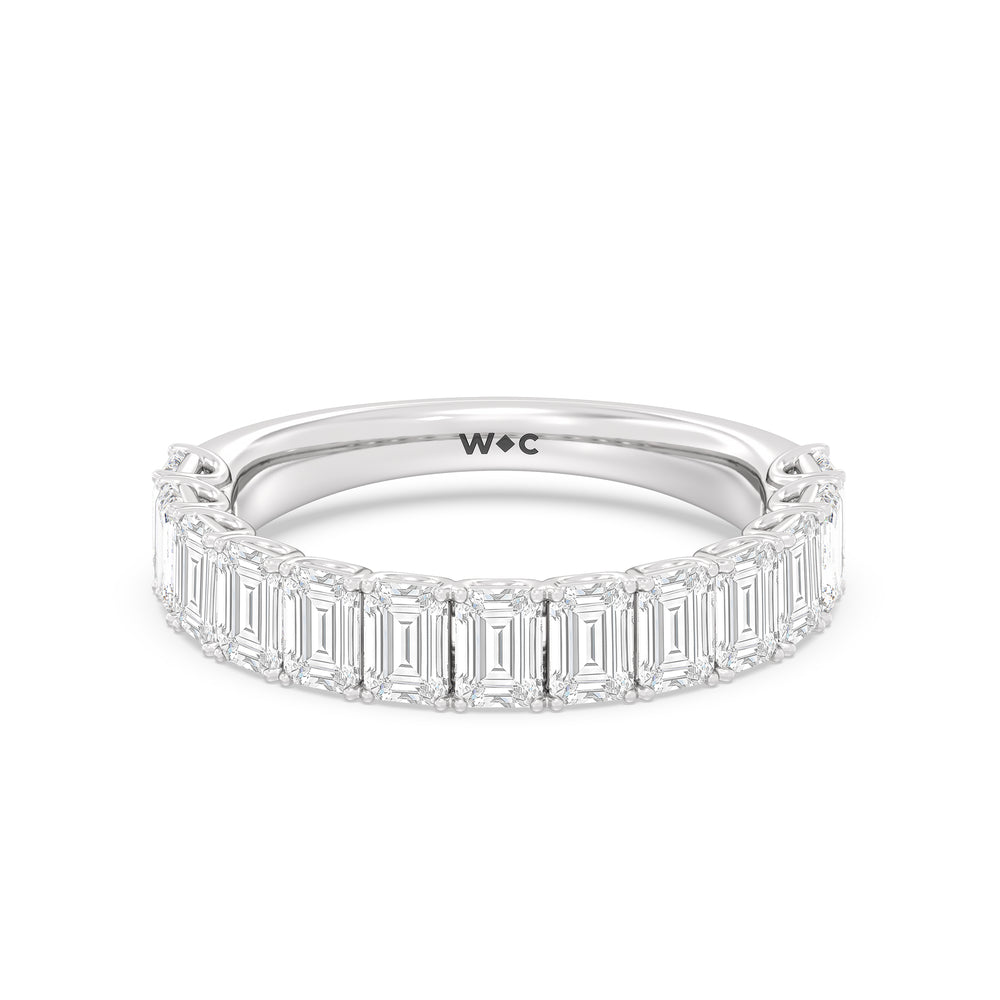 Elegance Emerald Accent Hidden Halo Diamond Wedding Band with Platinum Cut Diamond in 14KT Platinum view 1
