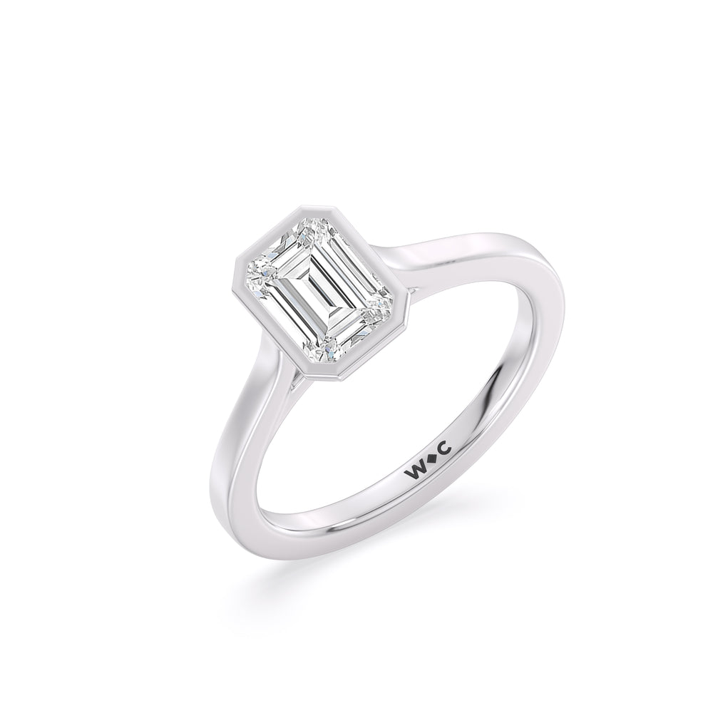 Fine Bezel Solitaire Engagement Ring with Emerald Cut Diamond in 14KT Platinum view 3
