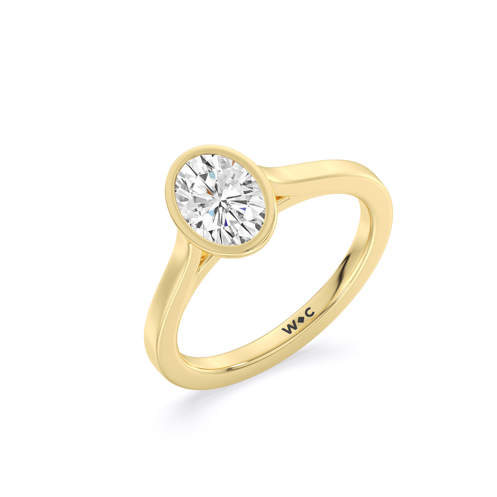 Fine Bezel Solitaire Engagement Ring with Oval Cut Diamond in 14KT Yellow Gold view 3
