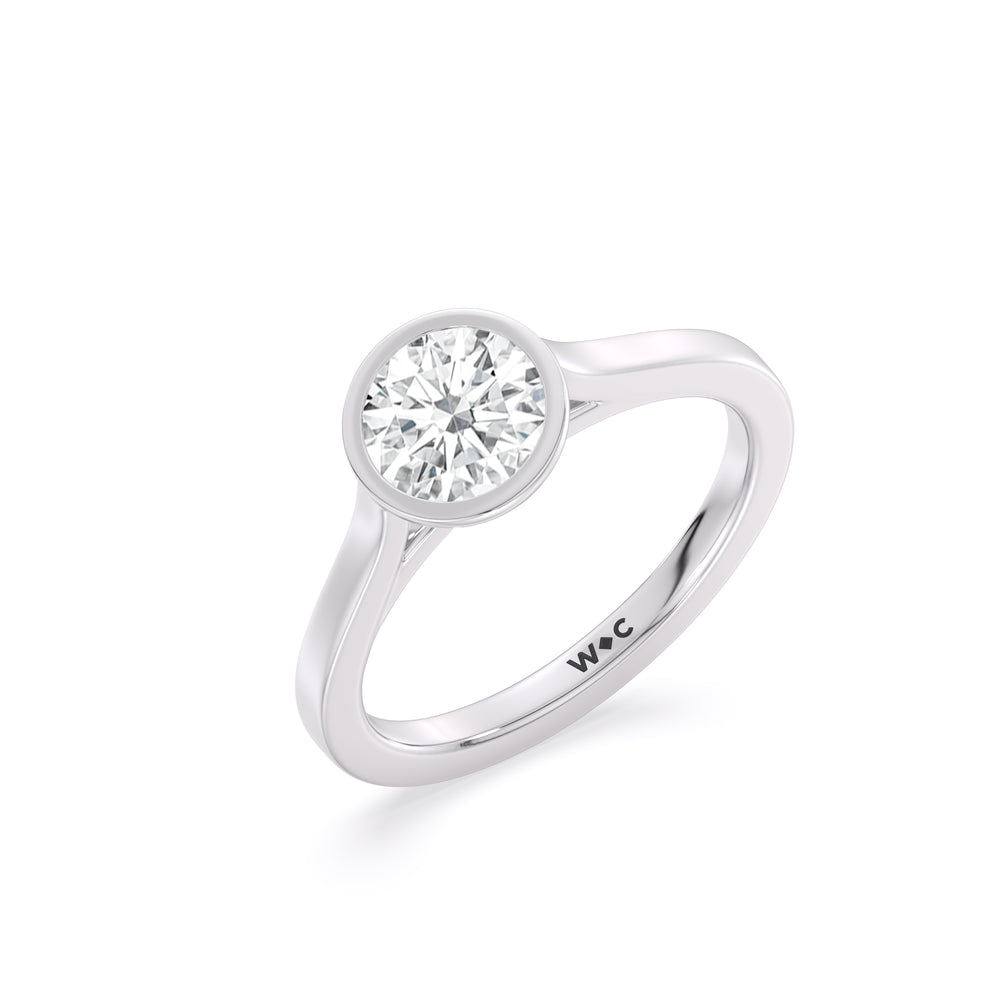Fine Bezel Solitaire Engagement Ring with Round Cut Diamond in 14KT Platinum view 3
