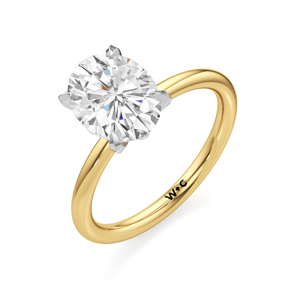 The W Classic Engagement Ring with Oval Cut Diamond in 14KT Yellow Gold & Platinum view 3
