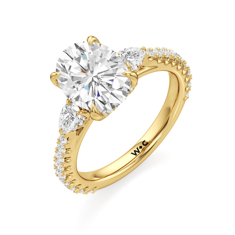 The Atrium Pear Three Stone Engagement Ring with Oval Cut Diamond in 14KT Yellow Gold view 4
