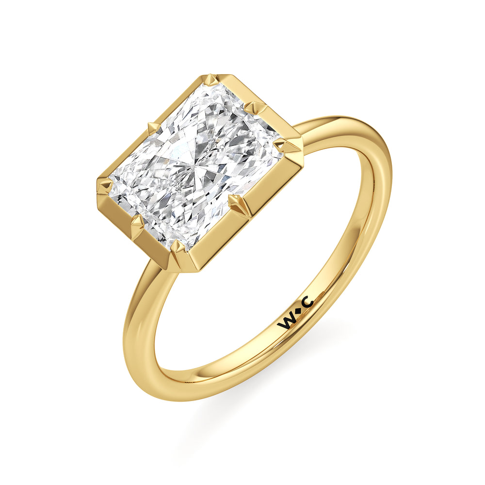 The Élodie Engagement Ring with West Radiant Cut Diamond in 14KT Yellow & White Gold view 3
