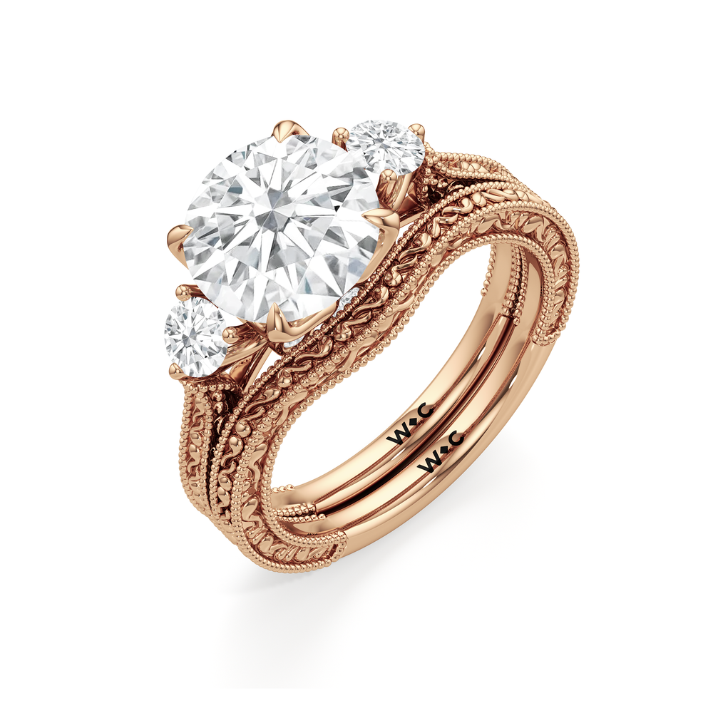 The Seraphine Round Three Stone Ring with Oval Cut Diamond in 14KT Rose Gold view 7
