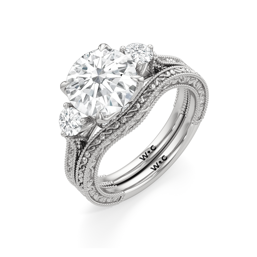 The Seraphine Round Three Stone Ring with Oval Cut Diamond in 14KT Platinum view 7
