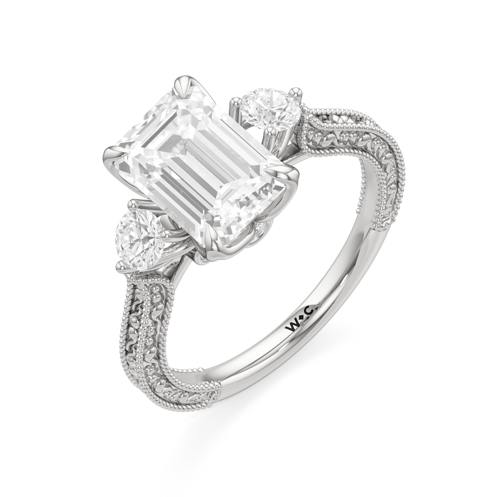 The Seraphine Round Three Stone Ring with Emerald Cut Diamond in 14KT Platinum view 6
