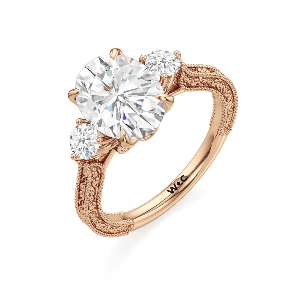 The Seraphine Round Three Stone Ring with Oval Cut Diamond in 14KT Rose Gold view 6
