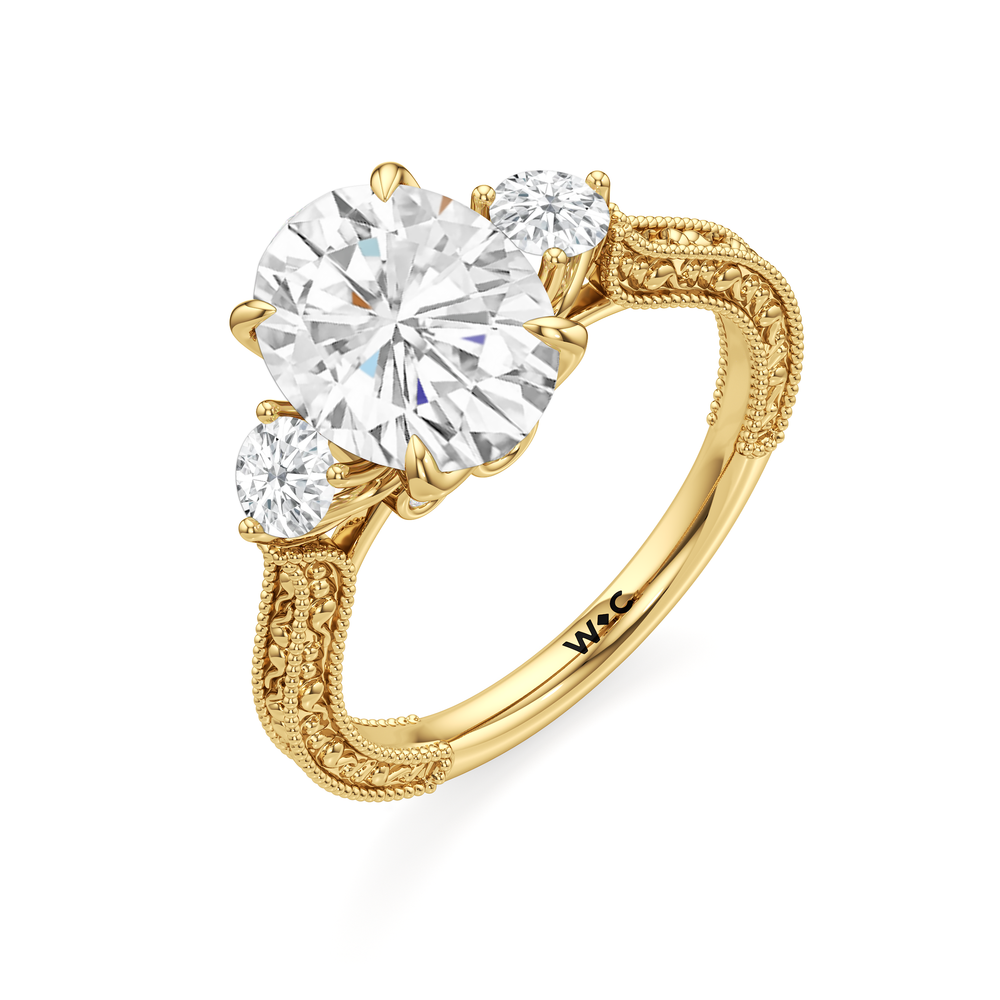 The Seraphine Round Three Stone Ring with Oval Cut Diamond in 14KT Yellow Gold view 6
