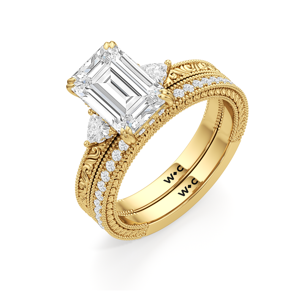 The Seraphine Trillion Three Stone Ring with Emerald Cut Diamond in 14KT Yellow Gold view 8
