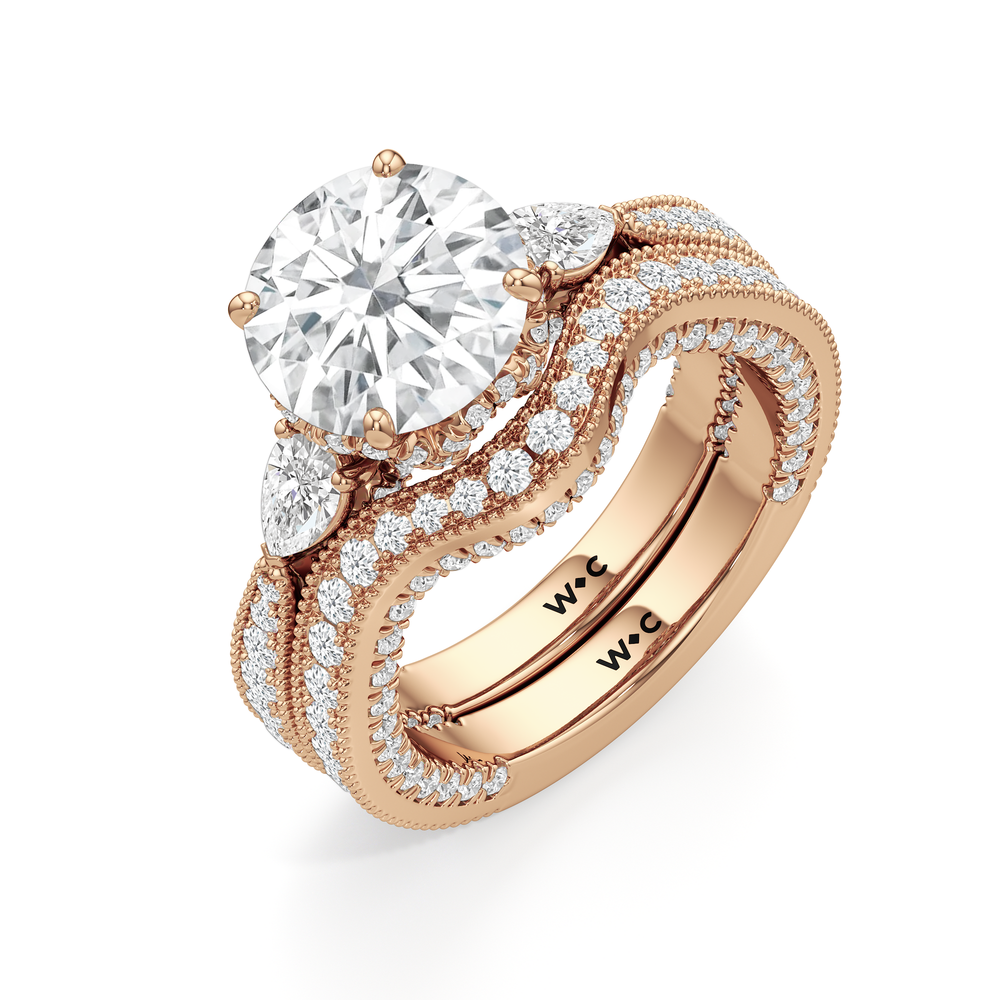 The Chrysler Pear Three Stone Ring with Oval Cut Diamond in 14KT Rose Gold view 7
