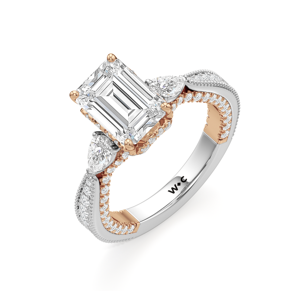The Chrysler Pear Three Stone Ring with Emerald Cut Diamond in 14KT White & Rose Gold view 3
