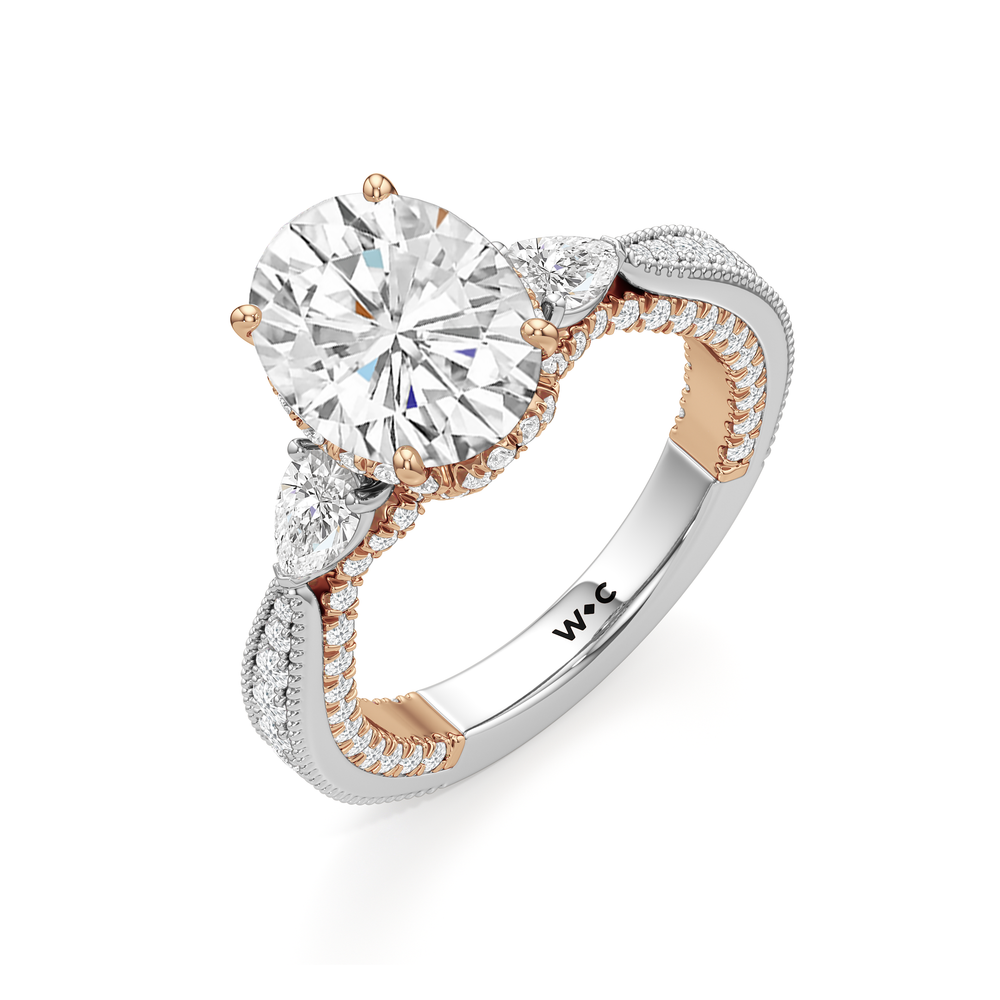 The Chrysler Pear Three Stone Ring with Oval Cut Diamond in 14KT White & Rose Gold view 6
