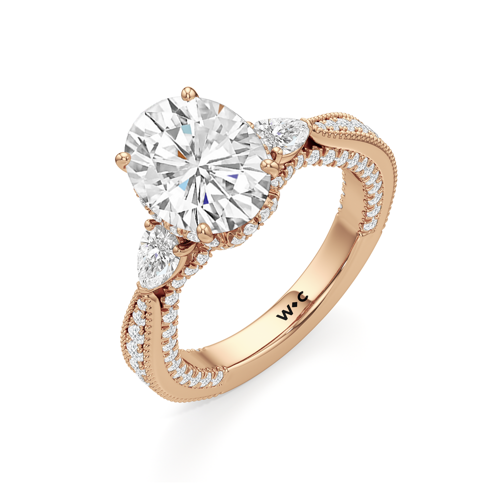 The Chrysler Pear Three Stone Ring with Oval Cut Diamond in 14KT Rose Gold view 6

