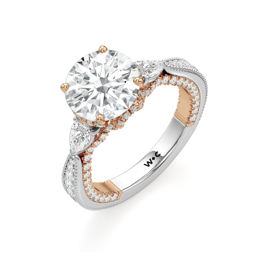 The Chrysler Pear Three Stone Ring with Round Cut Diamond in 14KT White & Rose Gold view 3
