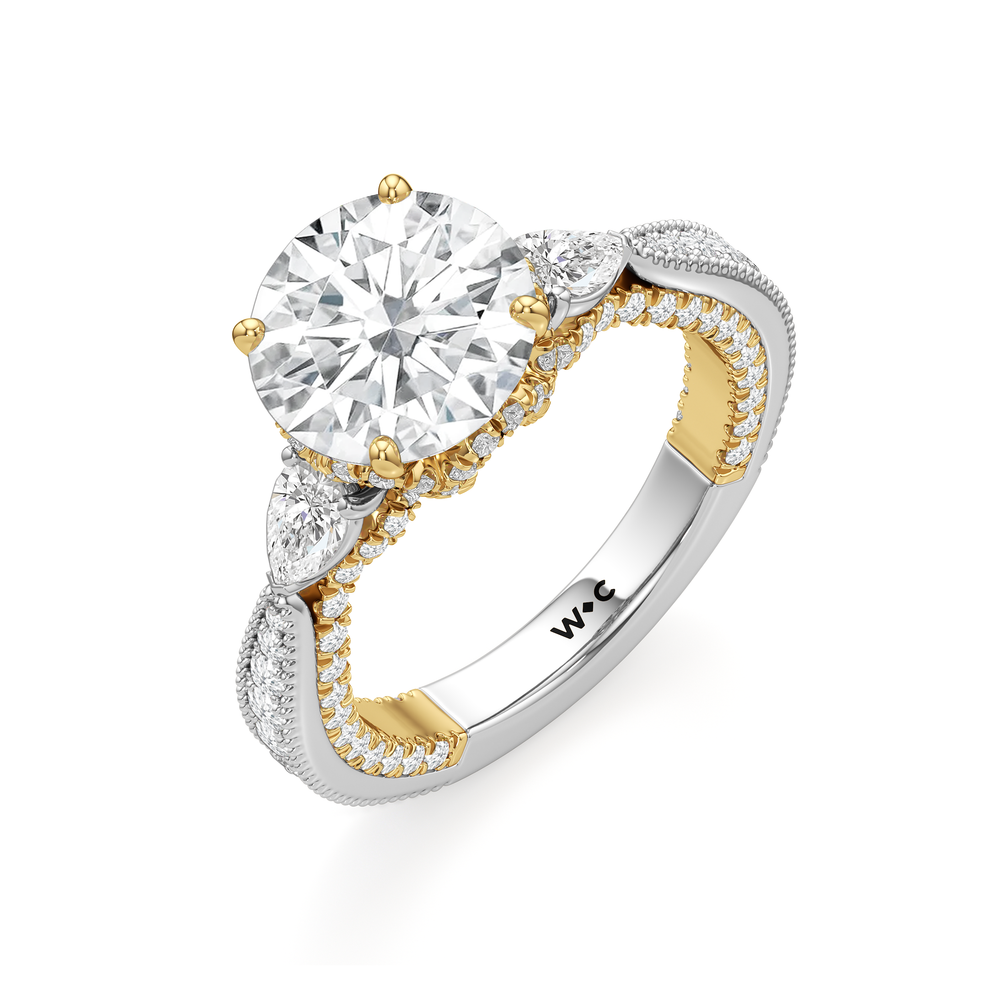 The Chrysler Pear Three Stone Ring with Round Cut Diamond in 14KT White & Yellow Gold view 3
