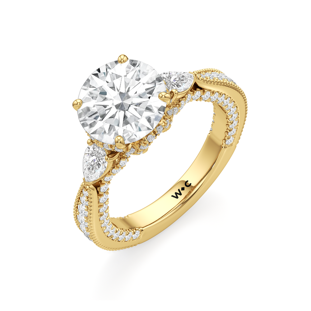 The Chrysler Pear Three Stone Ring with Round Cut Diamond in 14KT Yellow Gold view 6

