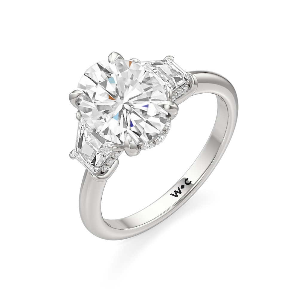 The Windsor Trapezoid Side Stone Engagement Ring with Oval Cut Diamond in 14KT Platinum view 3
