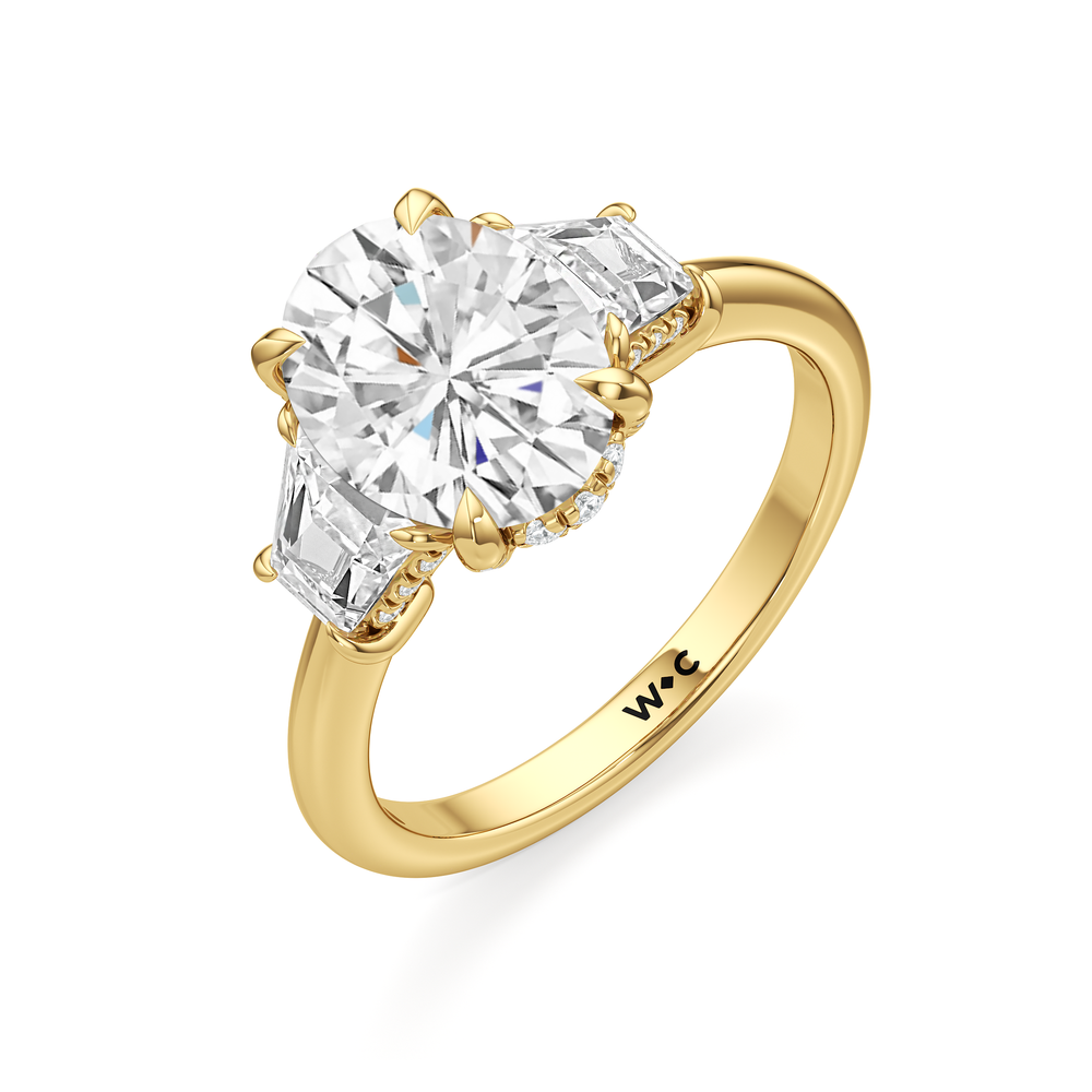The Windsor Trapezoid Side Stone Engagement Ring with Oval Cut Diamond in 14KT Yellow Gold view 3

