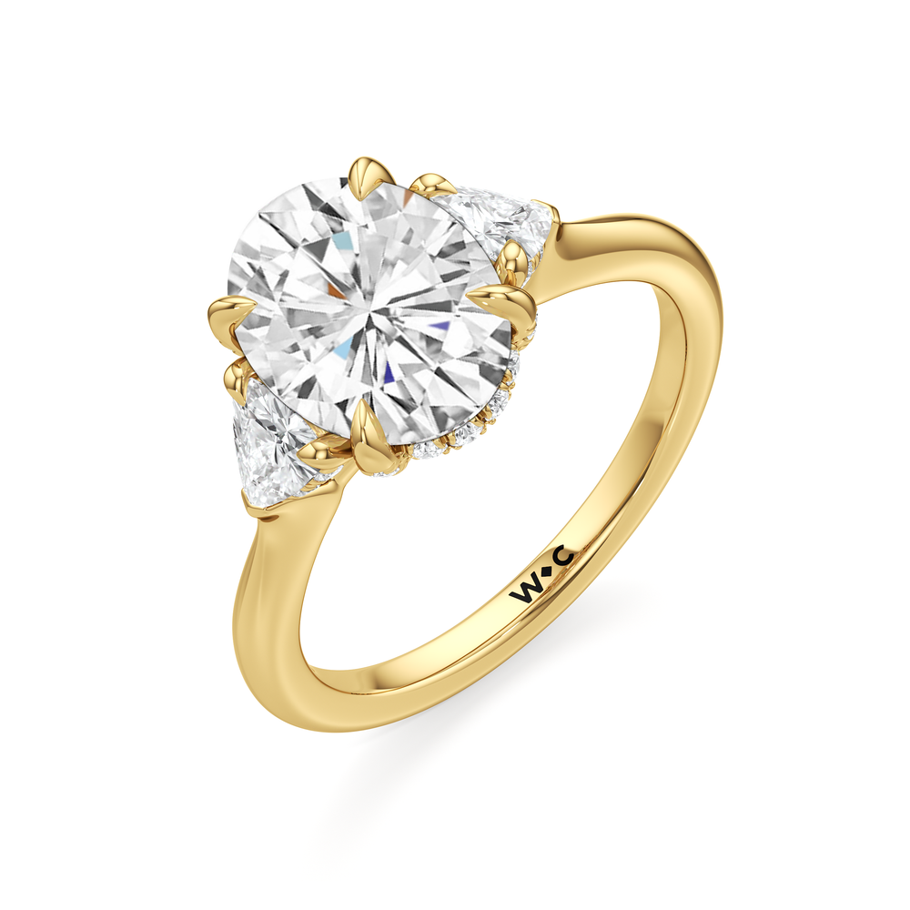 The Windsor Three Stone Trillion Engagement Ring with Oval Cut Diamond in 14KT Yellow Gold view 3
