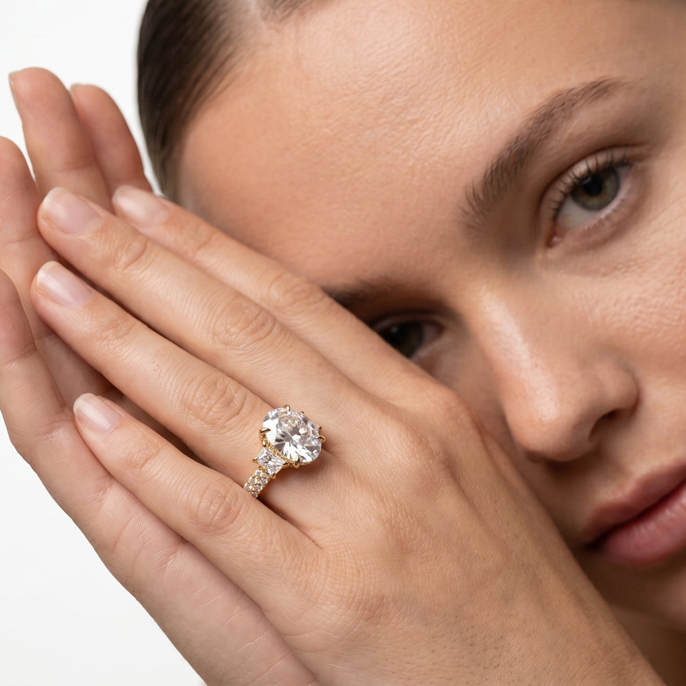 The Windsor Trapezoid Three Stone Ring with Oval Cut Diamond in 14KT Yellow Gold view 5
