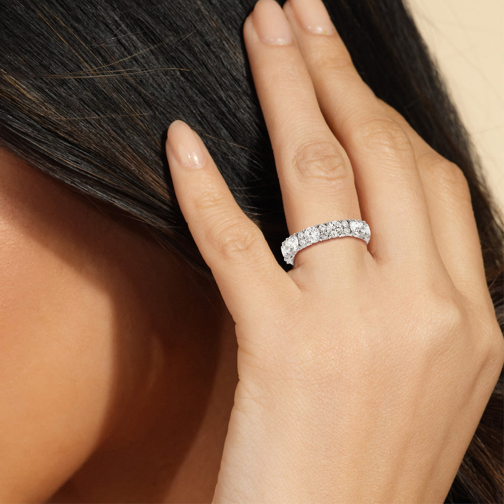 Model Wearing Round Station Eternity Ring 4 cttw view