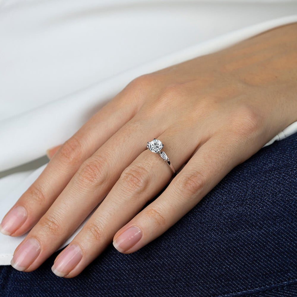 Model Wearing Three Stone Baguette Engagement Ring with Lab Grown Diamond view