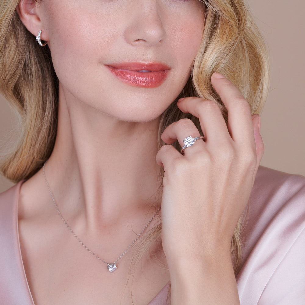 Model Wearing Three Stone Baguette Engagement Ring with Lab Grown Diamond view