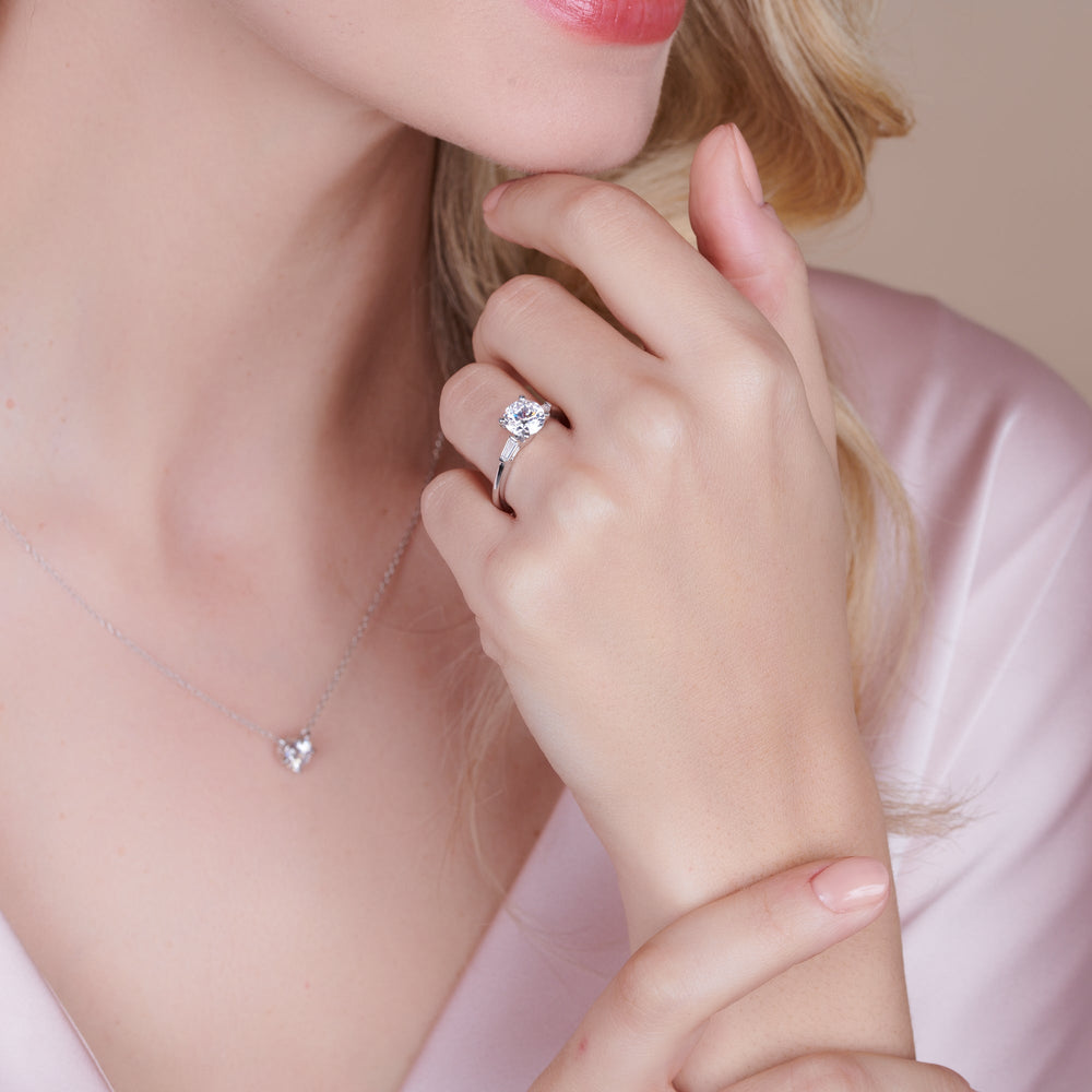 Model Wearing Three Stone Baguette Engagement Ring with Lab Grown Diamond view