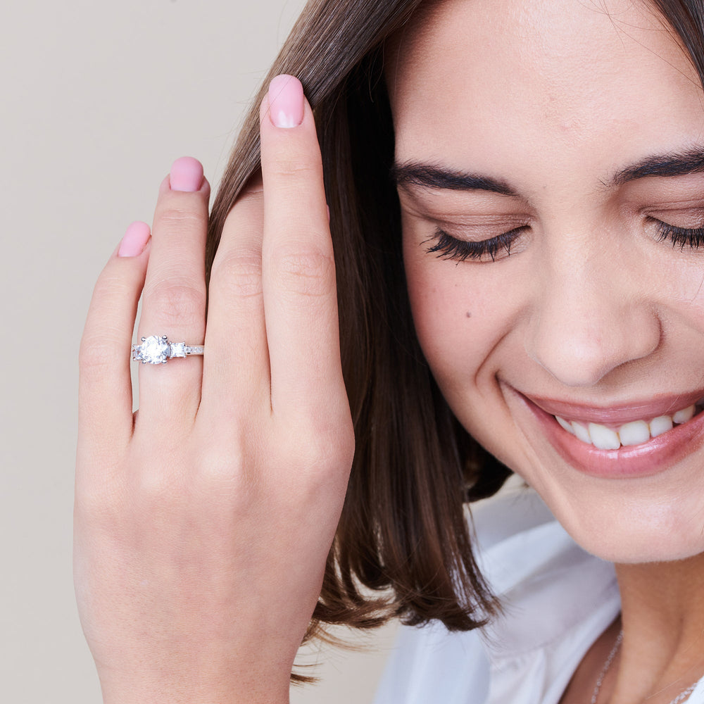 Model Wearing Three Stone Princess Studded Engagement Ring view