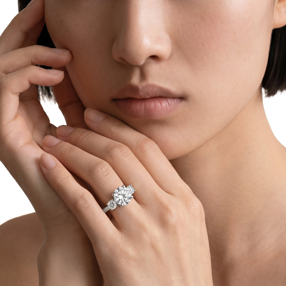 Oval Cut Three Stone Hidden Halo Cathedral Engagement Ring with Lab Grown Diamond in 14KT Yellow Gold view 2
