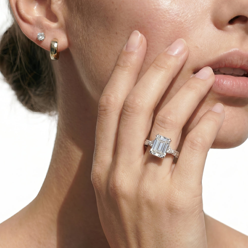 The Seraphine Trillion Three Stone Ring with Emerald Cut Diamond in 14KT Yellow Gold view 4
