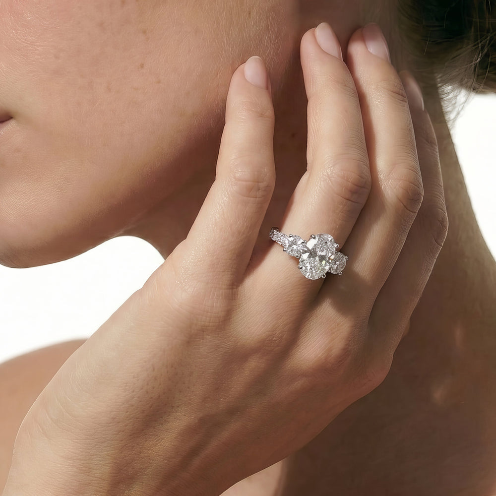 The Windsor Round Three Stone Ring with Oval Cut Diamond in 14KT Platinum view 3
