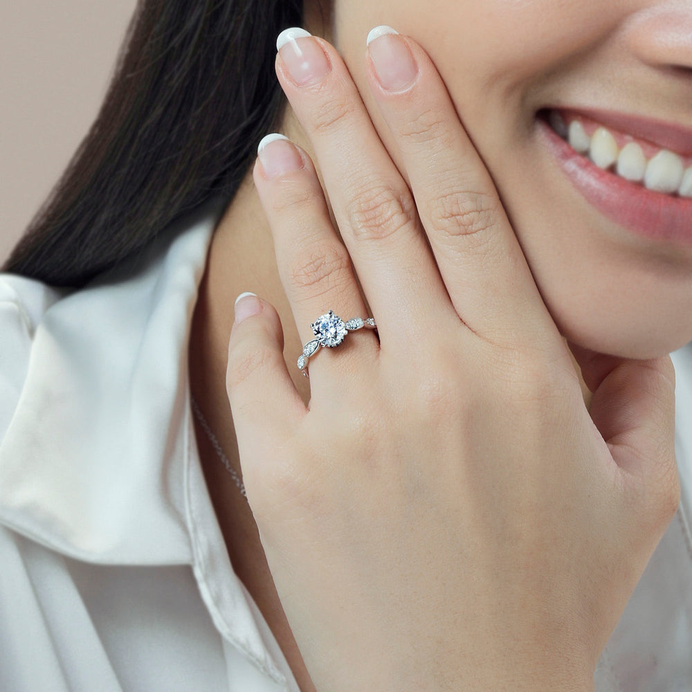Model Wearing Something Blue Gerbera Under Halo Engagement Ring with Lab Grown Diamond view