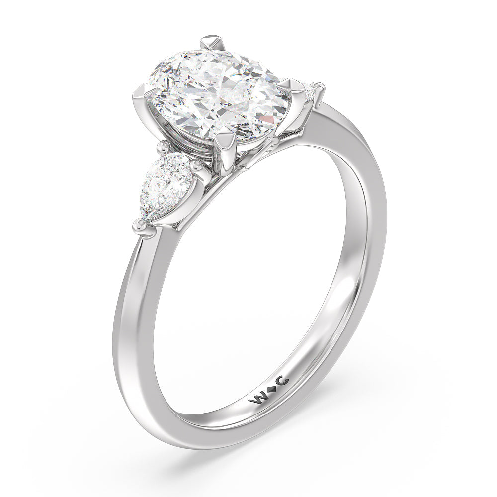 Elegant Three Stone Knife Edge Engagement Ring with Oval Cut Diamond in 14KT Platinum view 3
