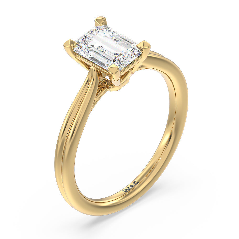 Grooved Taper Cathedral Solitaire Engagement Ring with Emerald Cut Diamond in 14KT Yellow Gold view 3
