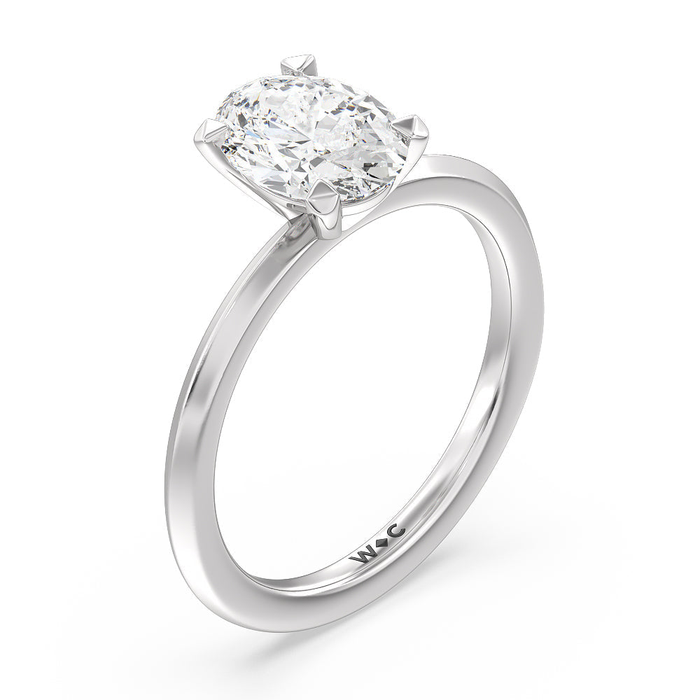 Petite Knife Edge Solitaire Engagement Ring with Oval Cut Diamond in 14KT Platinum view 3
