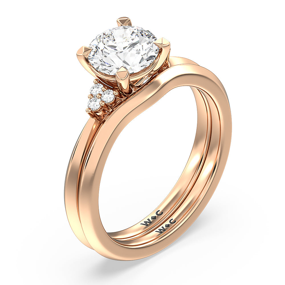 Taper Knife Edge Side Stone Engagement Ring with Emerald Cut Diamond in 14KT Rose Gold view 4
