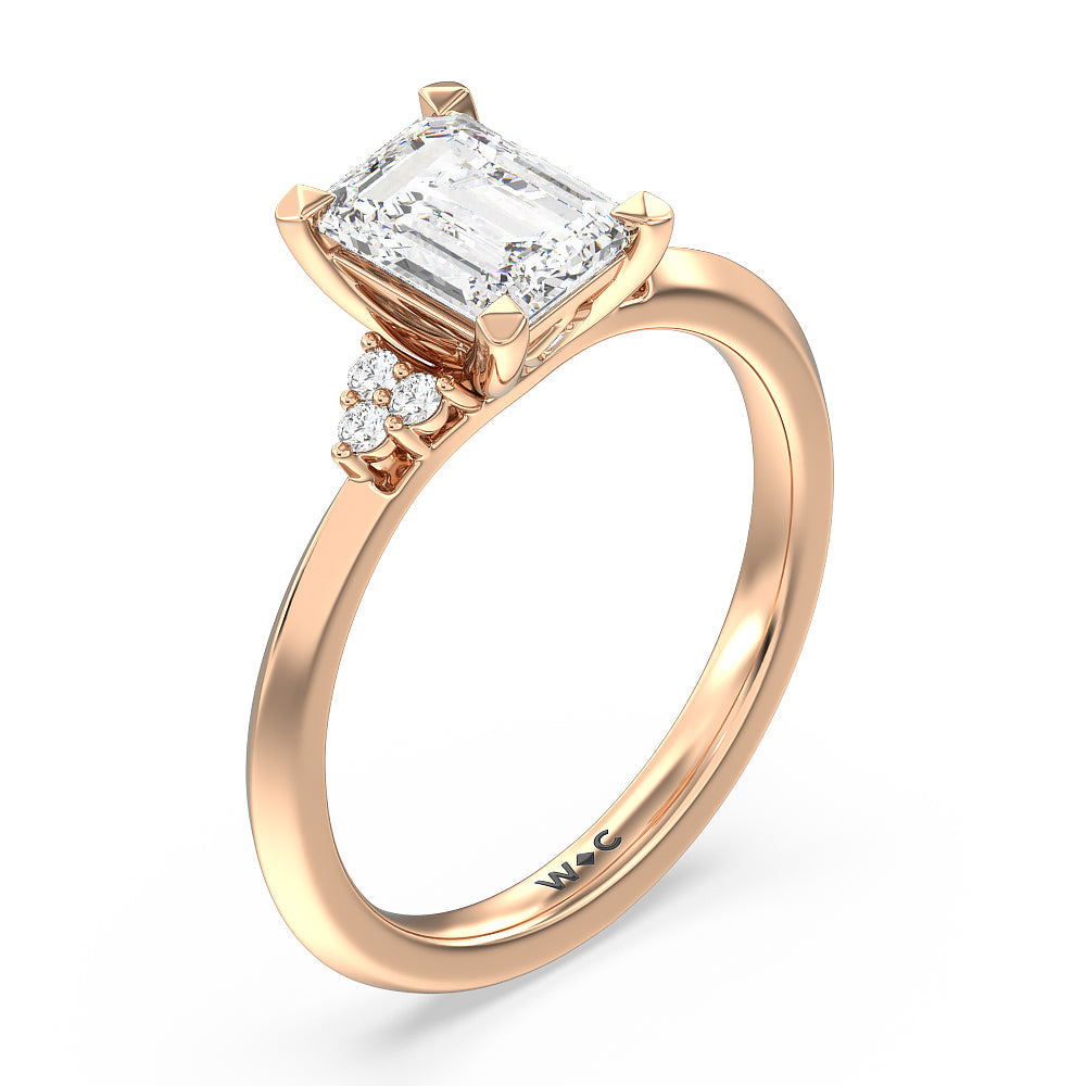 Taper Knife Edge Side Stone Engagement Ring with Emerald Cut Diamond in 14KT Rose Gold view 3

