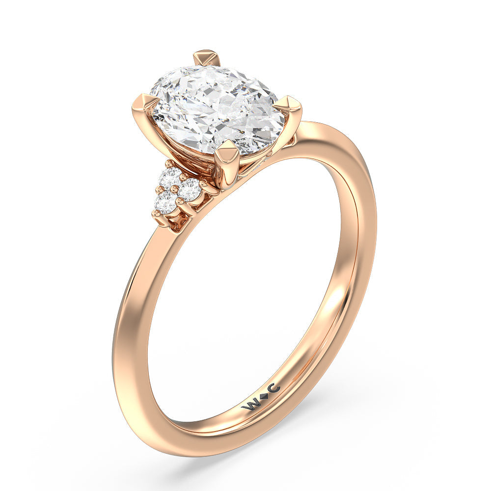 Taper Knife Edge Side Stone Engagement Ring with Oval Cut Diamond in 14KT Rose Gold view 3
