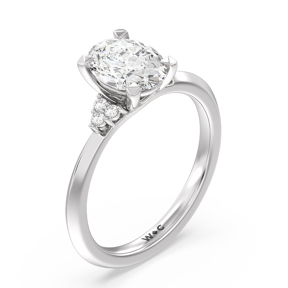 Taper Knife Edge Side Stone Engagement Ring with Oval Cut Diamond in 14KT Platinum view 3
