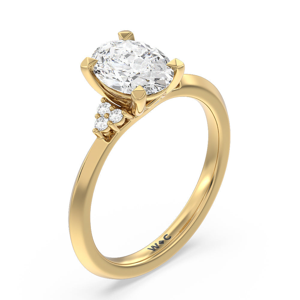 Taper Knife Edge Side Stone Engagement Ring with Oval Cut Diamond in 14KT Yellow Gold view 3
